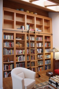 Built in bookshelf with rolling ladder.