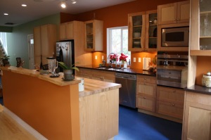 Live edge and frame and panel cabinets and bar top made from Whatcom County maple.