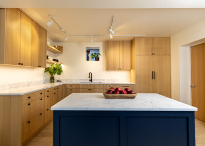 Finished modern kitchen with custom wood cabinetry